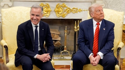 Canadian Prime Minister Mark Carney and US President Donald Trump engage in a meeting at the White House in Washington, DC. (AP) Canadian Prime Minister Mark Carney and US President Donald Trump engage in a meeting at the White House in Washington, DC. (AP)
