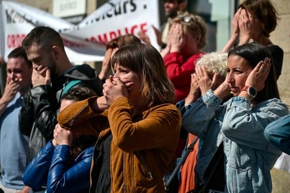 Protestors react during a demonstration in support of the victims of former surgeon Joel Le Scouarnec outside the court in Vannes, western France on May 19, 2025. (AFP) Protestors react during a demonstration in support of the victims of former surgeon Joel Le Scouarnec outside the court in Vannes, western France on May 19, 2025. (AFP)