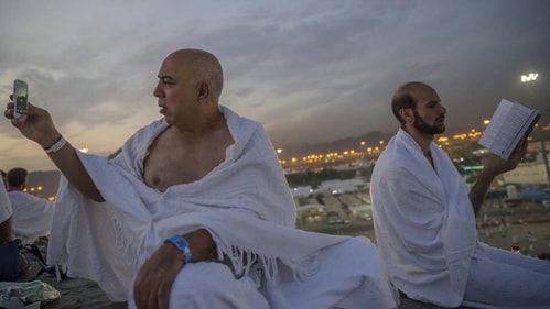 One of the Hajj rituals involve pilgrims heading to an area called Muzdalifa, west of Arafat. Many walk while others use buses. They spend the night picking up pebbles along the way that will be used in a symbolic stoning of the devil back in the city of Mina, where Muslims believe the devil tried to talk Ibrahim out of submitting to God’s will. (Image by Dar Yasin / AP) One of the Hajj rituals involve pilgrims heading to an area called Muzdalifa, west of Arafat. Many walk while others use buses. They spend the night picking up pebbles along the way that will be used in a symbolic stoning of the devil back in the city of Mina, where Muslims believe the devil tried to talk Ibrahim out of submitting to God’s will. (Image by Dar Yasin / AP)