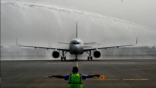 Navi Mumbai, India - Dec. 29, 2024:First commercial aircraft landing on the runway of Navi Mumbai International Airport Ltd at Ulwe in Navi Mumbai, India, on Sunday, December 29, 2024. (Photo by Bachchan Kumar/ HT PHOTO) (HT PHOTO)
