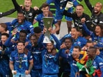 Chelsea's Reece James holds the trophy as he celebrates with his teammates after winning the Europa Conference League final soccer match between Real Betis and Chelsea in Wroclaw, Poland Chelsea's Reece James holds the trophy as he celebrates with his teammates after winning the Europa Conference League final soccer match between Real Betis and Chelsea in Wroclaw, Poland