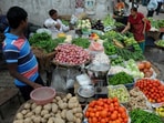 Customers at a vegetable market.(Parveen Kumar/ HT File Photo)