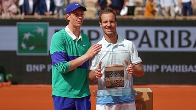 Italy's Jannik Sinner, left, stands by France's Richard Gasquet after their second round match of the French Tennis Open, at the Roland-Garros stadium, in Paris, Thursday (AP) Italy's Jannik Sinner, left, stands by France's Richard Gasquet after their second round match of the French Tennis Open, at the Roland-Garros stadium, in Paris, Thursday (AP)