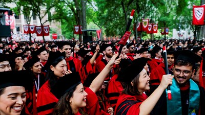 Graduating students cheer for Harvard University President Alan Garber during the 374th Commencement exercises at Harvard University in Cambridge, Massachusetts, U.S., May 29, 2025. (Reuters)