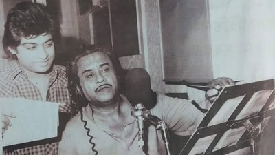 Kishore Kumar and Amit Kumar at a recording session, circa 1970s. Kishore Kumar and Amit Kumar at a recording session, circa 1970s.