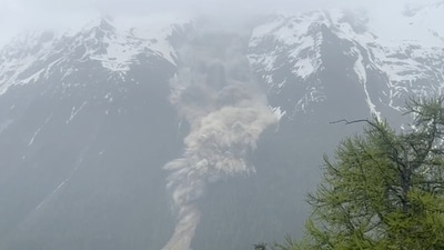 Mud and rocks slide down a mountain after a glacier partially collapsed covering most of the village of Blatten, Switzerland May 28, 2025, in this screen grab taken from a handout video. Pomona Media/Handout via REUTERS