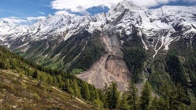 This photograph taken above Wiler shows the Bietschhorn mountain in the Swiss Alps after part of the huge Birch Glacier collapsed the day before and destroyed the small village of Blatten, on May 29, 2025. Swiss authorities were on May 29, 2025 monitoring for possible flood risk in a southern valley, following a massive glacier collapse that created a huge pile of debris after destroying a small village. On May 28 the Birch glacier in Switzerland's southern Wallis region collapsed, sending tons of rock, ice and scree hurtling down the mountain slope and into the valley below. The barrage largely destroyed the hamlet of Blatten, which had been home to 300 people and was evacuated last week due to the impending danger. (Photo by FABRICE COFFRINI / AFP) (AFP) This photograph taken above Wiler shows the Bietschhorn mountain in the Swiss Alps after part of the huge Birch Glacier collapsed the day before and destroyed the small village of Blatten, on May 29, 2025. Swiss authorities were on May 29, 2025 monitoring for possible flood risk in a southern valley, following a massive glacier collapse that created a huge pile of debris after destroying a small village. On May 28 the Birch glacier in Switzerland's southern Wallis region collapsed, sending tons of rock, ice and scree hurtling down the mountain slope and into the valley below. The barrage largely destroyed the hamlet of Blatten, which had been home to 300 people and was evacuated last week due to the impending danger. (Photo by FABRICE COFFRINI / AFP) (AFP)