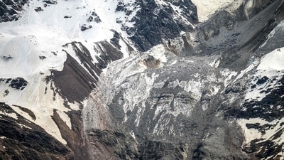 TOPSHOT - A helicopter of the Swiss air forces flies above the Birch Glacier that collapsed the day before and destroyed the small village of Blatten in the Swiss Alps, in Wiler on May 29, 2025. Swiss authorities were on May 29, 2025 monitoring for possible flood risk in a southern valley, following a massive glacier collapse that created a huge pile of debris after destroying a small village. On May 28 the Birch glacier in Switzerland's southern Wallis region collapsed, sending tons of rock, ice and scree hurtling down the mountain slope and into the valley below. The barrage largely destroyed the hamlet of Blatten, which had been home to 300 people and was evacuated last week due to the impending danger. (Photo by FABRICE COFFRINI / AFP) (AFP) TOPSHOT - A helicopter of the Swiss air forces flies above the Birch Glacier that collapsed the day before and destroyed the small village of Blatten in the Swiss Alps, in Wiler on May 29, 2025. Swiss authorities were on May 29, 2025 monitoring for possible flood risk in a southern valley, following a massive glacier collapse that created a huge pile of debris after destroying a small village. On May 28 the Birch glacier in Switzerland's southern Wallis region collapsed, sending tons of rock, ice and scree hurtling down the mountain slope and into the valley below. The barrage largely destroyed the hamlet of Blatten, which had been home to 300 people and was evacuated last week due to the impending danger. (Photo by FABRICE COFFRINI / AFP) (AFP)
