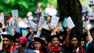 Graduate students of Harvard Graduate School Of Education react during the 374th Commencement exercises at Harvard University in Cambridge, Massachusetts, U.S., May 29. (REUTERS)