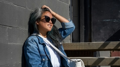 Grey hair appearing at a young age, often referred to as premature greying, can be caused by a combination of genetic factors, lifestyle choices, and underlying health conditions. (Representative picture: Unsplash) Grey hair appearing at a young age, often referred to as premature greying, can be caused by a combination of genetic factors, lifestyle choices, and underlying health conditions. (Representative picture: Unsplash)