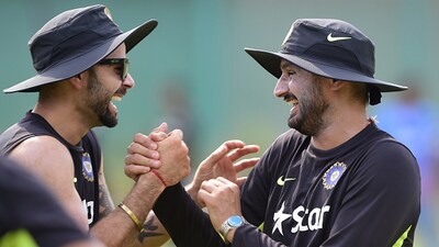 File photo of Virat Kohli and Harbhajan Singh (AFP) File photo of Virat Kohli and Harbhajan Singh (AFP)