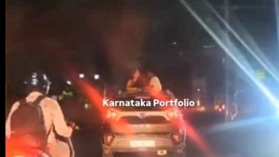 Bengaluru couple was caught violating traffic rules and was later fined by traffic police. (Screen grab from Karnataka Portfolio X account. )