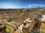 The ruins of the Roman city of Herculaneum, near present-day Naples. The scrolls and fragments were found in an underground library. (Adobe Stock)