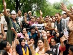 Women raise slogans as they stage a protest over the killing of the Uttarakhand receptionist and demanding justice for her in Delhi. Women raise slogans as they stage a protest over the killing of the Uttarakhand receptionist and demanding justice for her in Delhi.