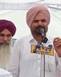 Balkor Singh, father of Shubhdeep Singh Sidhu Moose Wala, addressing a gathering on the latter’s third death anniversary in Mansa on Thursday. (HT Photo)