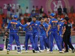 IPL 2025, GT vs MI IPL Highlights, Gujarat Titans vs Mumbai Indians: Mumbai Indians' captain Hardik Pandya, center without cap, celebrates with teammates after their win.