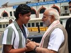 Prime Minister Narendra Modi with Vaibhav Suryavanshi at the Patna airport. Prime Minister Narendra Modi with Vaibhav Suryavanshi at the Patna airport.