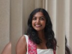 Megha Vemuri wore a red keffiyeh, a scarf that shows support for Palestine, as she spoke to fellow graduates at MIT Megha Vemuri wore a red keffiyeh, a scarf that shows support for Palestine, as she spoke to fellow graduates at MIT