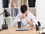 Sitting at a desk for a long time, working on a laptop, may make your shoulders feel stiff and sore. Sitting at a desk for a long time, working on a laptop, may make your shoulders feel stiff and sore.