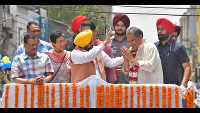AAP national convener Arvind Kejriwal, former Delhi CM Atishi Marlena, Punjab CM Bhagwant Mann and Punjab AAP president Aman Arora accompanying party candidate Sanjeev Arora for filing of nomination papers in Ludhiana on Friday. They took out a roadshow from Aarti Chowk and ended at Bhai Bala Chowk in the city. (Gurpreet Singh/HT) AAP national convener Arvind Kejriwal, former Delhi CM Atishi Marlena, Punjab CM Bhagwant Mann and Punjab AAP president Aman Arora accompanying party candidate Sanjeev Arora for filing of nomination papers in Ludhiana on Friday. They took out a roadshow from Aarti Chowk and ended at Bhai Bala Chowk in the city. (Gurpreet Singh/HT)