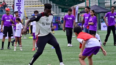 Manchester United player Andre Onana dribbling with football during meet-and-greet session with their fans in Mumbai. (Hindustan Times)