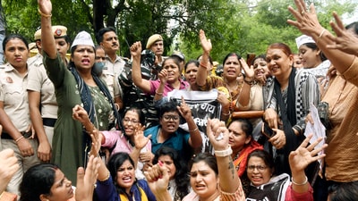 Women raise slogans as they stage a protest over the killing of the Uttarakhand receptionist and demanding justice for her in Delhi. (ANI File) Women raise slogans as they stage a protest over the killing of the Uttarakhand receptionist and demanding justice for her in Delhi. (ANI File)