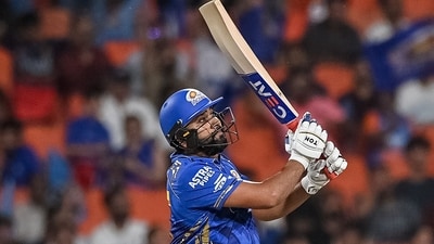 Mumbai Indians' Rohit Sharma watches the ball after playing a shot during the Indian Premier League (IPL) Twenty20 Eliminator (AFP) Mumbai Indians' Rohit Sharma watches the ball after playing a shot during the Indian Premier League (IPL) Twenty20 Eliminator (AFP)
