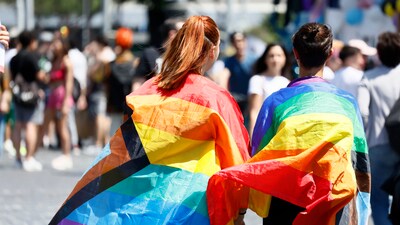 FILE - People wrapped in rainbow flags take part in the LGBTQ+ Pride parade in Rome, Saturday, June 10, 2023. (Cecilia Fabiano/LaPresse via AP, File) (AP) FILE - People wrapped in rainbow flags take part in the LGBTQ+ Pride parade in Rome, Saturday, June 10, 2023. (Cecilia Fabiano/LaPresse via AP, File) (AP)