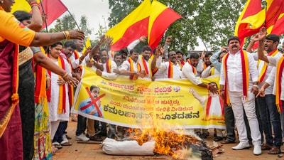 Members of Kannada Rakshana Vedike burn an effigy during a protest against actor Kamal Haasan over his "Tamil gave birth to Kannada" remarks. (PTI) Members of Kannada Rakshana Vedike burn an effigy during a protest against actor Kamal Haasan over his "Tamil gave birth to Kannada" remarks. (PTI)