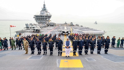 Union Defence Minister Rajnath Singh, Chief of the Naval Staff (CNS) Admiral Dinesh K Tripathi and others during an interaction aboard aircraft carrier INS Vikrant off Goa. (PTI) Union Defence Minister Rajnath Singh, Chief of the Naval Staff (CNS) Admiral Dinesh K Tripathi and others during an interaction aboard aircraft carrier INS Vikrant off Goa. (PTI)