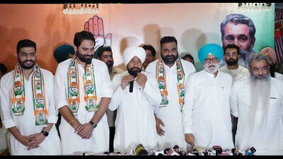Satnam Singh Sunny Master was inducted into the party by former chief minister Charanjit Singh Channi, former cabinet minister Rana Gurjit, party candidate Bharat Bhushan Ashu and others. (HT Photo)