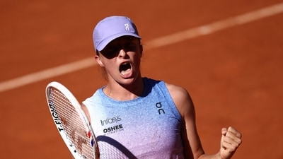 Poland's Iga Swiatek celebrates after winning against Romania's Jaqueline Cristian at the end of their women's singles (AFP) Poland's Iga Swiatek celebrates after winning against Romania's Jaqueline Cristian at the end of their women's singles (AFP)