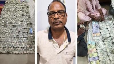 The cash seized from the residences of Odisha chief engineer Baikuntha Nath Sarangi (centre) after the raids. (Vigilance department) The cash seized from the residences of Odisha chief engineer Baikuntha Nath Sarangi (centre) after the raids. (Vigilance department)