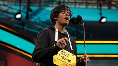 NATIONAL HARBOR, MARYLAND - MAY 29: Faizan Zaki, 13, of Dallas, Texas spells his word in the finals of the 2025 Scripps National Spelling Bee at the Gaylord National Resort and Convention Center on May 29, 2025 in National Harbor, Maryland. 243 spellers from all over the globe ages 8 to 14 competed from May 27 to May 30, 2025 and were narrowed down to 9 finalists during the 100th anniversary of the bee. Kayla Bartkowski/Getty Images/AFP (Photo by Kayla Bartkowski / GETTY IMAGES NORTH AMERICA / Getty Images via AFP) (Getty Images via AFP) NATIONAL HARBOR, MARYLAND - MAY 29: Faizan Zaki, 13, of Dallas, Texas spells his word in the finals of the 2025 Scripps National Spelling Bee at the Gaylord National Resort and Convention Center on May 29, 2025 in National Harbor, Maryland. 243 spellers from all over the globe ages 8 to 14 competed from May 27 to May 30, 2025 and were narrowed down to 9 finalists during the 100th anniversary of the bee. Kayla Bartkowski/Getty Images/AFP (Photo by Kayla Bartkowski / GETTY IMAGES NORTH AMERICA / Getty Images via AFP) (Getty Images via AFP)