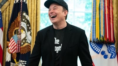 Elon Musk laughs during a news conference with US President Donald Trump in the Oval Office of the White House in Washington, DC, on May 30, 2025. Musk, who stormed into US politics as President Trump's chainsaw-brandishing sidekick, announced on May 28 that he is leaving his role in US government, intended to reduce federal spending, shortly after his first major break with the President over Trump's signature spending bill. (Photo by Allison ROBBERT / AFP) (AFP) Elon Musk laughs during a news conference with US President Donald Trump in the Oval Office of the White House in Washington, DC, on May 30, 2025. Musk, who stormed into US politics as President Trump's chainsaw-brandishing sidekick, announced on May 28 that he is leaving his role in US government, intended to reduce federal spending, shortly after his first major break with the President over Trump's signature spending bill. (Photo by Allison ROBBERT / AFP) (AFP)