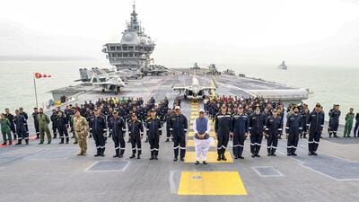Union defence minister Rajnath Singh (centre), Chief of the Naval Staff Admiral Dinesh K Tripathi and others aboard aircraft carrier INS Vikrant off Goa. (Defence ministry) Union defence minister Rajnath Singh (centre), Chief of the Naval Staff Admiral Dinesh K Tripathi and others aboard aircraft carrier INS Vikrant off Goa. (Defence ministry)