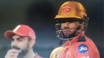 Virat Kohli can be seen chatting with his teammate about Musheer Khan (Screengrab - JioHotstar ) Virat Kohli can be seen chatting with his teammate about Musheer Khan (Screengrab - JioHotstar )