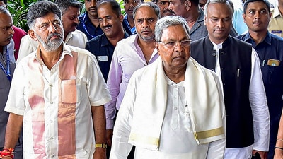 Karnataka chief minister Siddaramaiah, deputy chief minister DK Shivakumar, with Congress MLAs in Bengaluru. (PTI) Karnataka chief minister Siddaramaiah, deputy chief minister DK Shivakumar, with Congress MLAs in Bengaluru. (PTI)