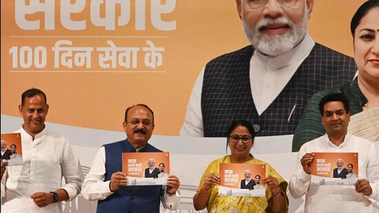 Delhi chief minster Rekha Gupta with her cabinet colleagues Ashish Sood , Kapil Mishra and Ravindra Kumar Indraj during a press conference on completion of 100 days at Delhi Secretariat in New Delhi on Friday. (Vipin Kumar/HT Photo)