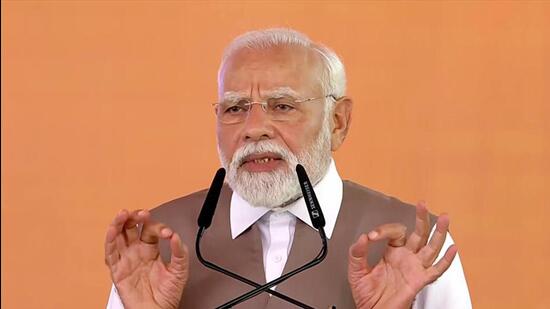 Prime Minister Narendra Modi at a public meeting in Kanpur on Friday. (ANI PHOTO)