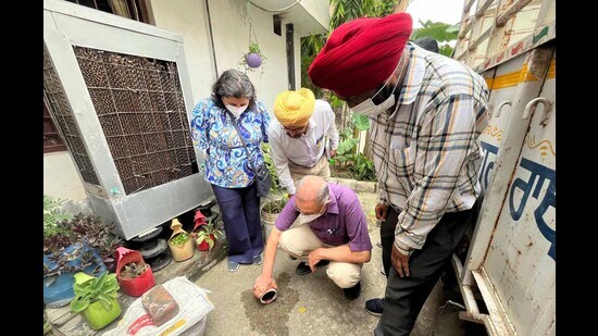 Punjab health minister Dr Balbir Singh conducting an inspection at New Kailash Nagar in Ludhiana on Friday. (HT Photo)