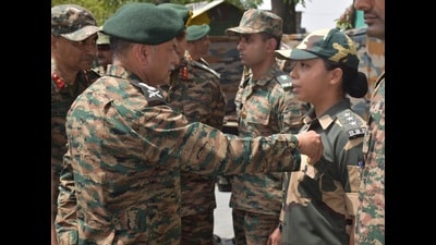 Army chief Gen Upendra Dwivedi honouring BSF Assistant Commandant Neha Bhandari in Akhnoor on Saturday. (Courtesy: X) Army chief Gen Upendra Dwivedi honouring BSF Assistant Commandant Neha Bhandari in Akhnoor on Saturday. (Courtesy: X)