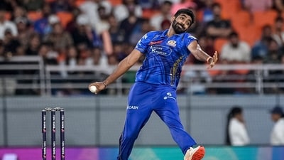 Mumbai Indians' Jasprit Bumrah bowls during the Indian Premier League (IPL) Twenty20 Eliminator cricket match between Gujarat Titans and Mumbai Indians (AFP)