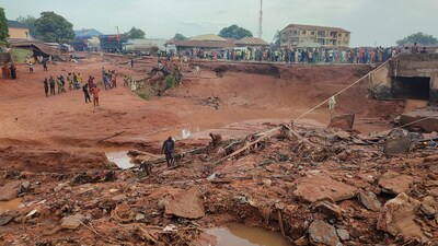 People search in flooded area following a downpour in Mokwa, Nigeria on Friday, May 30, 2025. (AP)