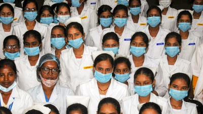 Nurses during preparations of wards for Covid-19 patients at a hospital in the wake of several states reporting Covid cases, in Ranchi, Monday. (PTI) Nurses during preparations of wards for Covid-19 patients at a hospital in the wake of several states reporting Covid cases, in Ranchi, Monday. (PTI)