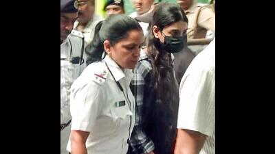 Sharmistha Panoli, arrested from Gurugram by Kolkata Police for allegedly hurting religious sentiments through her comments on social media being produced in Alipore Court, in Kolkata on Saturday. (ANI Grab)