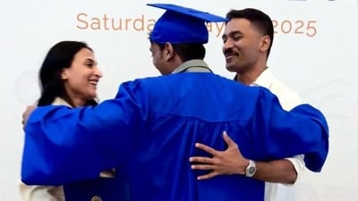 Dhanush and Aishwarya Rajinikanth were seen hugging son Yathra. Dhanush and Aishwarya Rajinikanth were seen hugging son Yathra.