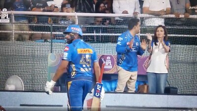 Akash and Nita Ambani give Rohit Sharma a standing ovation (Screengrab - JioHotstar ) Akash and Nita Ambani give Rohit Sharma a standing ovation (Screengrab - JioHotstar )