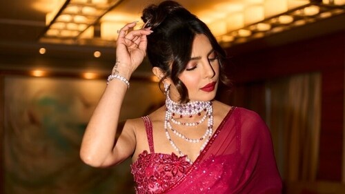 Priyanka Chopra wears a diamond bracelet and vintage pearl necklace by Bulgari to her brother's wedding. (Instagram)