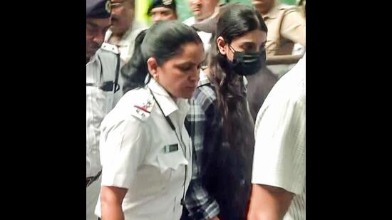 Sharmistha Panoli, arrested from Gurugram by Kolkata Police for allegedly hurting religious sentiments through her comments on social media being produced in Alipore Court, in Kolkata on Saturday. (ANI Grab)